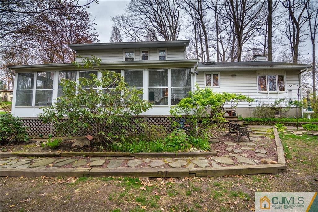 240 Hamlin Road North Brunswick, NJ 08902 - Photo 24 of 24 a front view of a house with garden