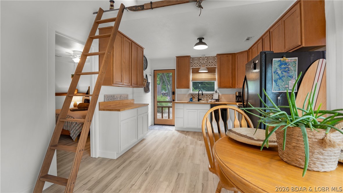109 Red Cedar Road Sunrise Beach, MO 65079 - Photo 16 of 31 1/2 Loft ( Ladder stores on side wall)