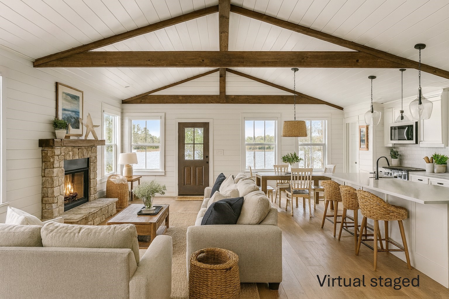 a living room with furniture a fireplace and a table