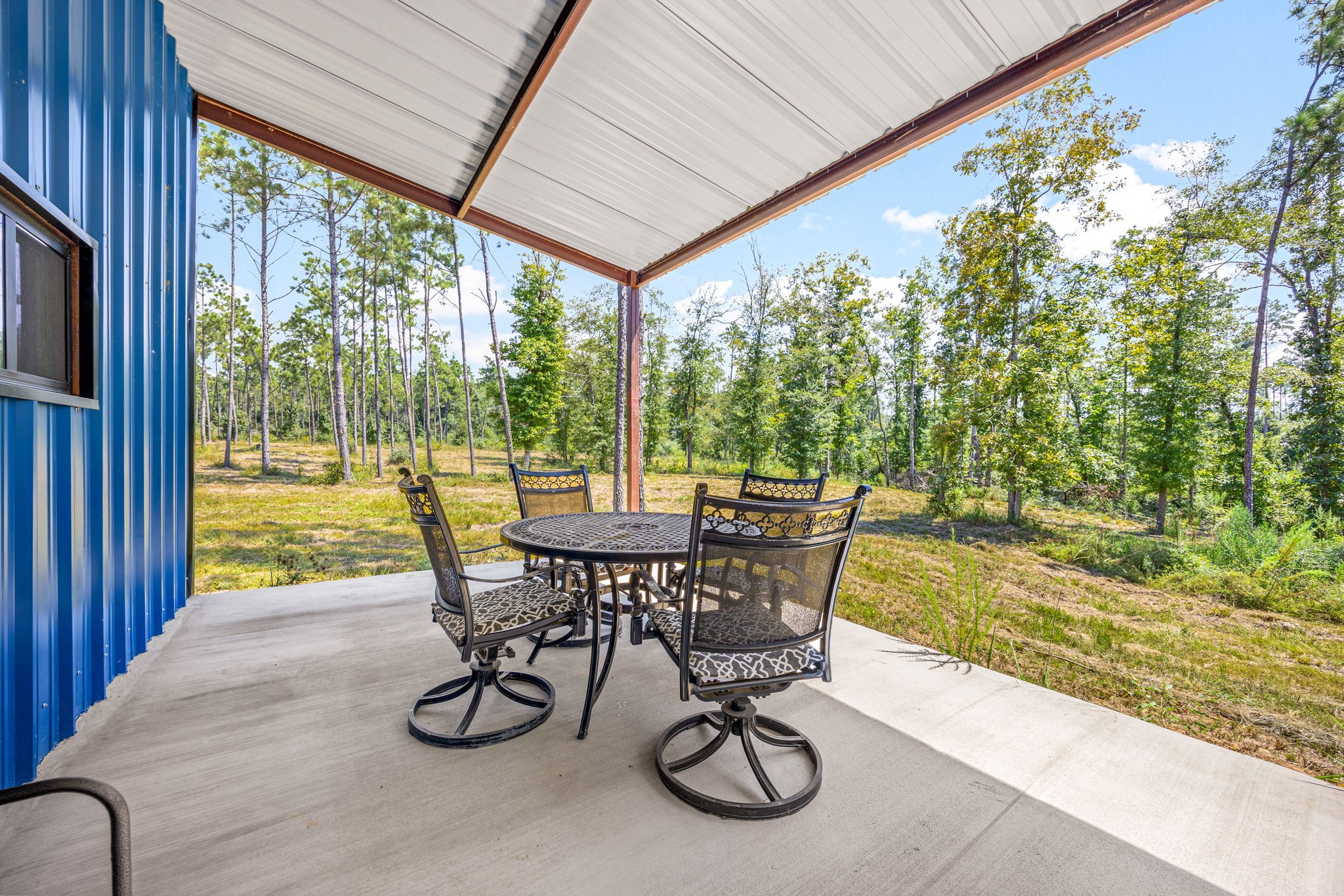 1100 Reveille Road Livingston, TX 77351 - Photo 11 of 20 a view of swimming pool with a table and chairs
