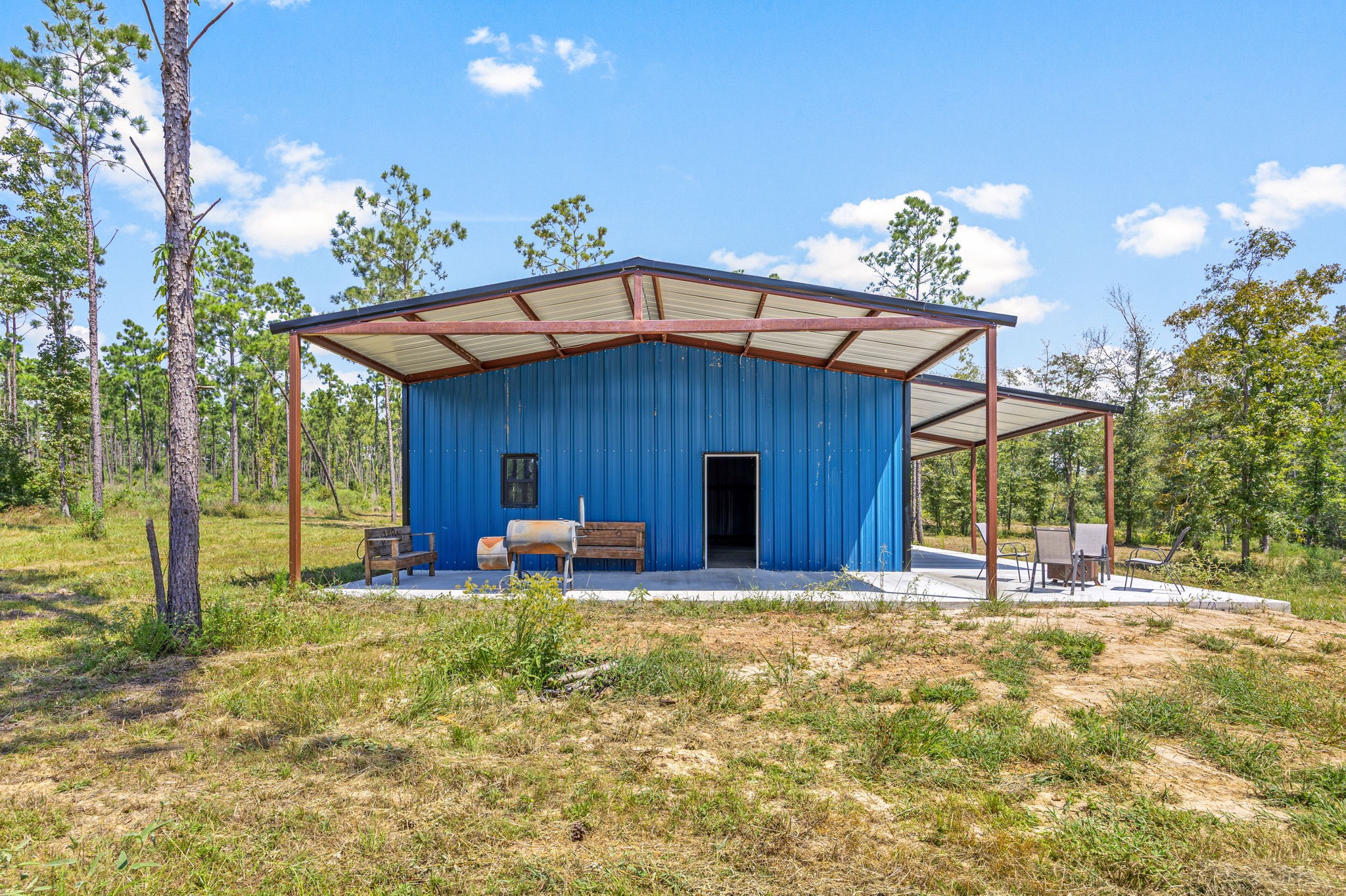 1100 Reveille Road Livingston, TX 77351 - Photo 2 of 20 a house view with a sitting space