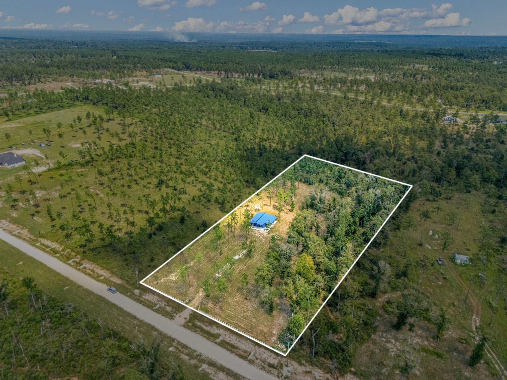 1100 Reveille Road Livingston, TX 77351 - Photo 3 of 20 a view of a tennis court