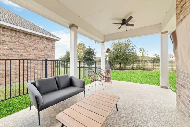 a view of a patio with a backyard