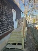 a bathroom with a stove and a shower