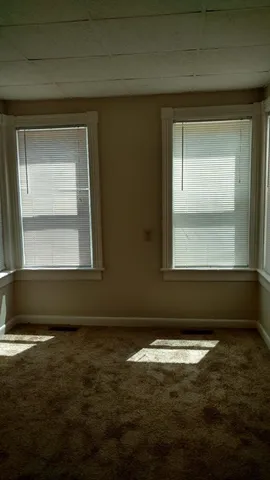 a view of a windows in an empty room