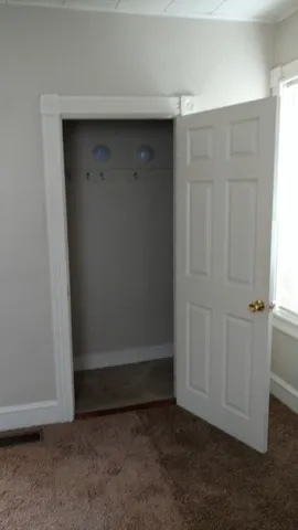 an empty room with closet