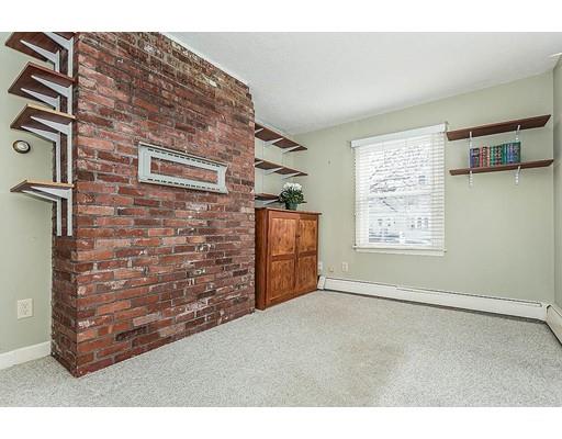 6 Philips Road Stoneham, MA 02180 - Photo 5 of 25 a view of an empty room with windows