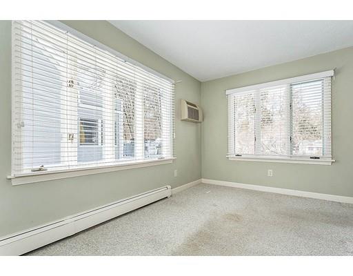 6 Philips Road Stoneham, MA 02180 - Photo 6 of 25 a view of an empty room with a window