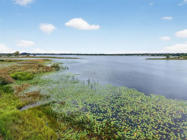 a view of a lake from a yard