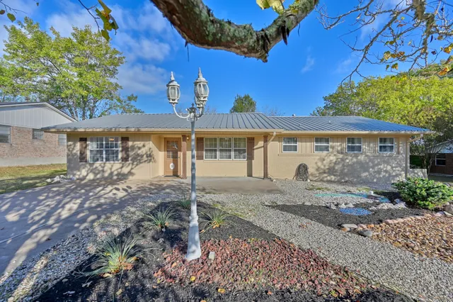 a view of a house with a patio