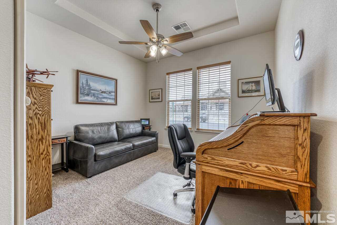 9950 Bernborough Drive Reno, NV 89521 - Photo 16 of 29 a living room with furniture and a window