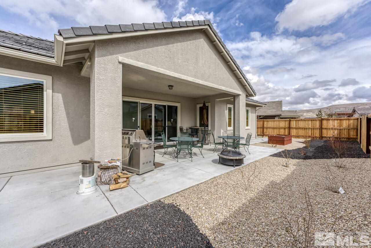 9950 Bernborough Drive Reno, NV 89521 - Photo 19 of 29 a view of a house with patio
