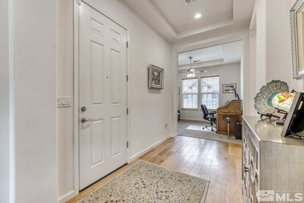 9950 Bernborough Drive Reno, NV 89521 - Photo 2 of 29 a living room with furniture and a wooden floor