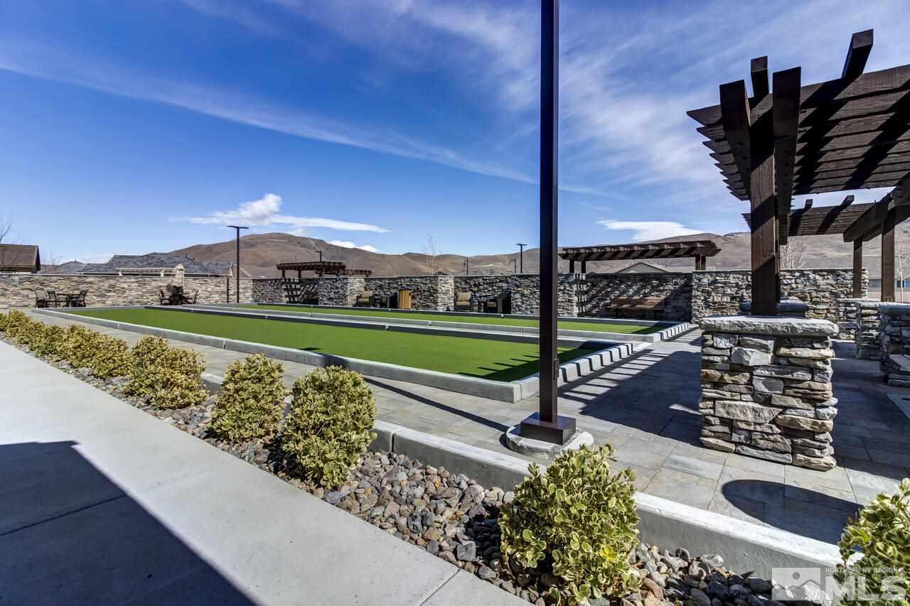 9950 Bernborough Drive Reno, NV 89521 - Photo 26 of 29 a view of a swimming pool with a yard