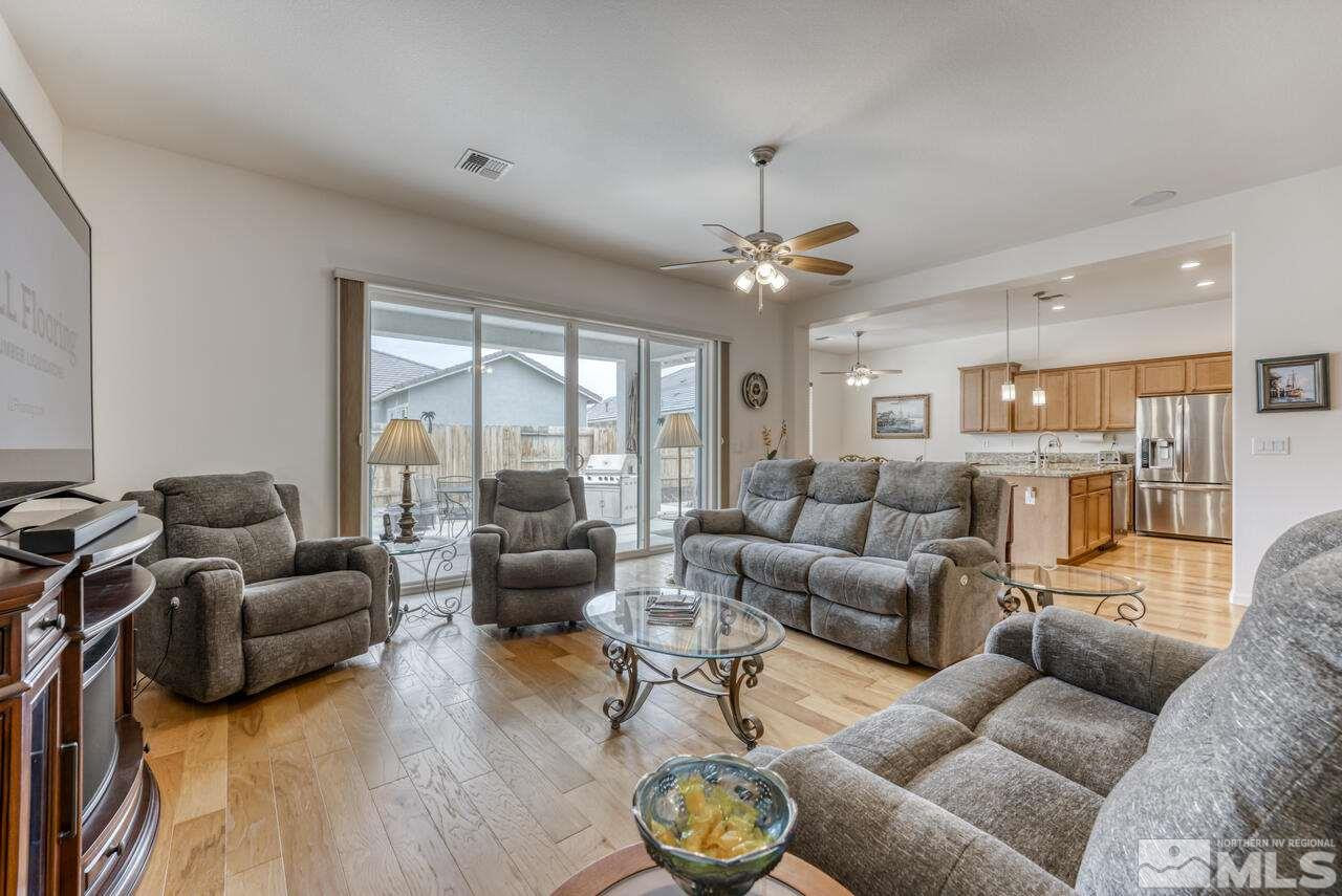 9950 Bernborough Drive Reno, NV 89521 - Photo 5 of 29 a living room with furniture and a large window