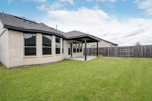 a house view with a garden space