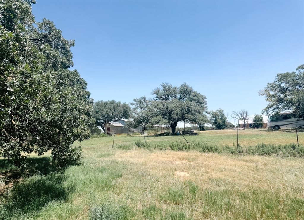 13610 Hwy 183 Rising Star Tx 76471 Rising Star, TX 76471 - Photo 36 of 39 View of yard featuring a view of rural / pastoral area