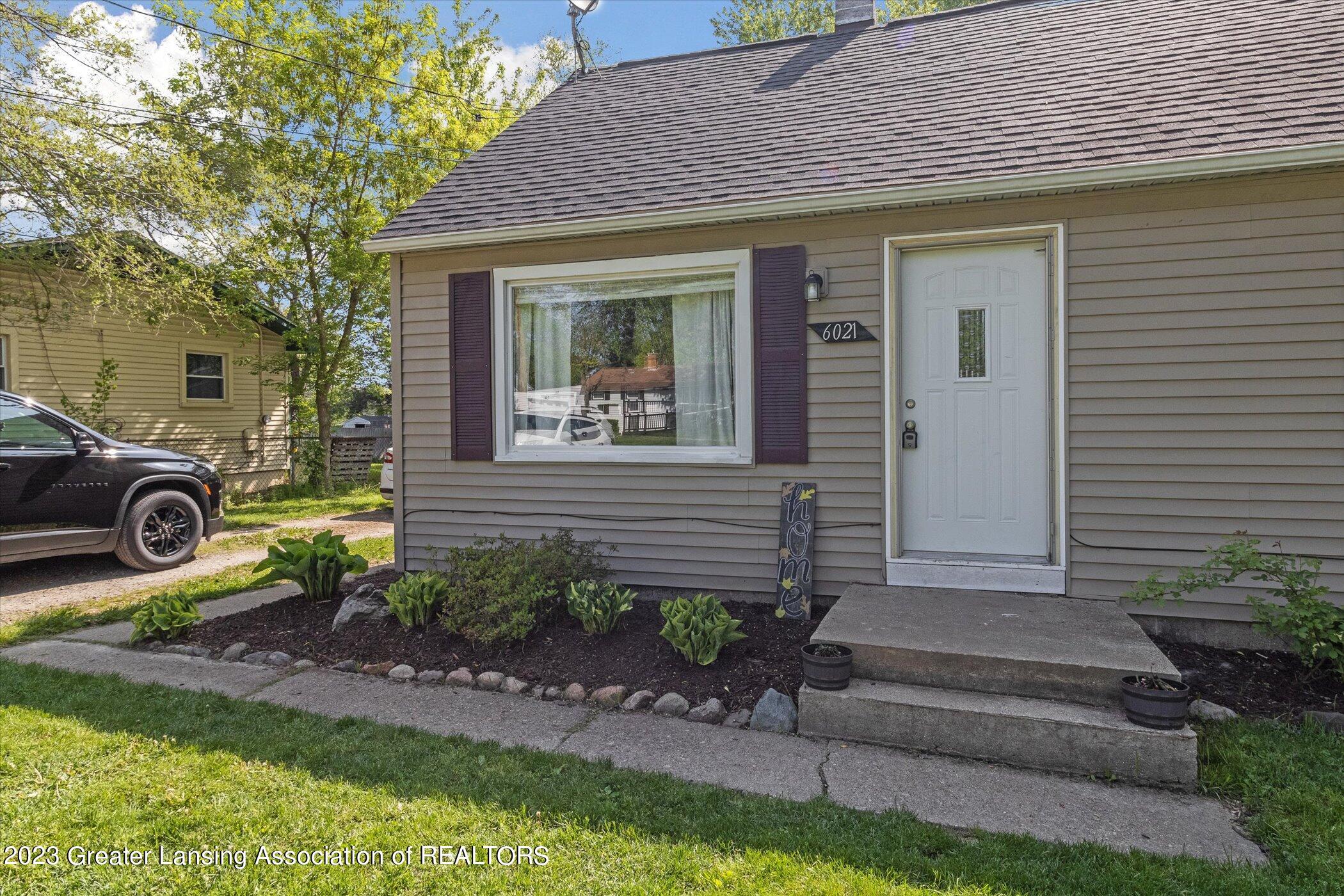 6021 Hughes Road Lansing, MI 48911 - Photo 5 of 38 05-6021-Hughes-Rd-Lansing-MI-48911-Windo