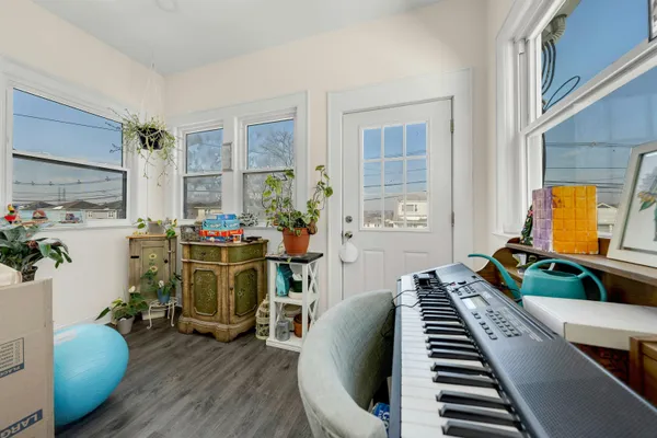 a bedroom with a bed and a tv in it