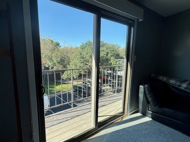 1501 Barton Springs Road, Unit 231 Austin, TX 78704 - Photo 13 of 23 Primary bedroom with balcony.