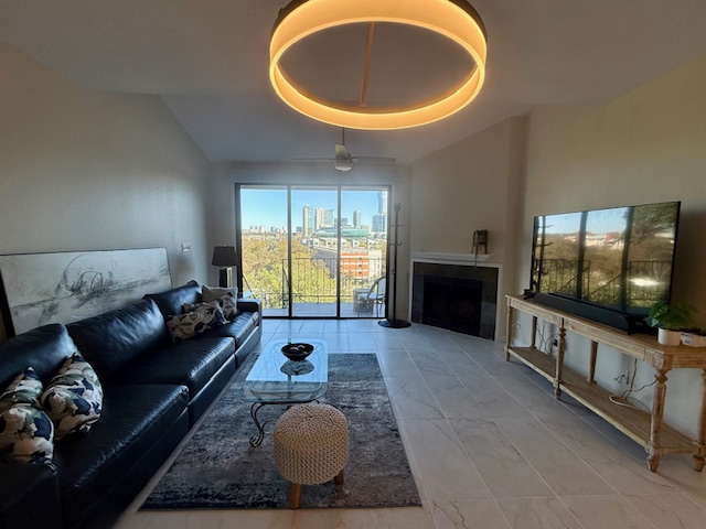 1501 Barton Springs Road, Unit 231 Austin, TX 78704 - Photo 3 of 23 Spacious living room. Sliding glass door onto balcony.