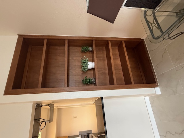 1501 Barton Springs Road, Unit 231 Austin, TX 78704 - Photo 8 of 23 Built-in bookcase in the living room.