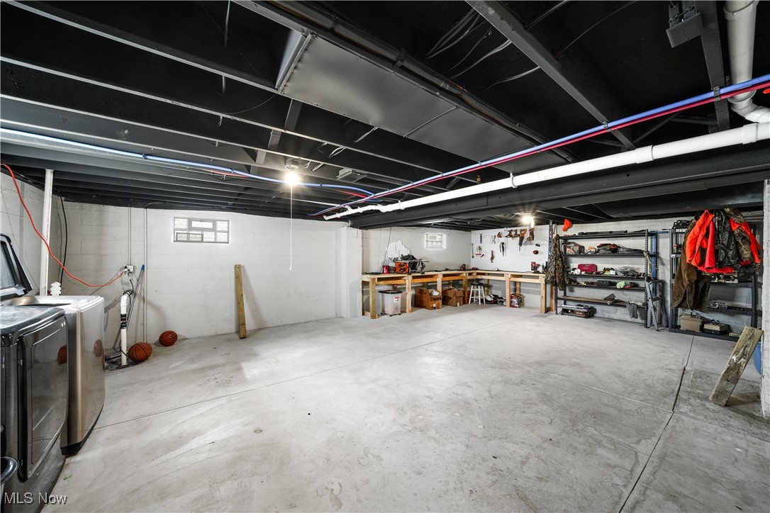 2991 Bushnell Campbell Road Fowler, OH 44418 - Photo 21 of 41 Basement featuring independent washer and dryer