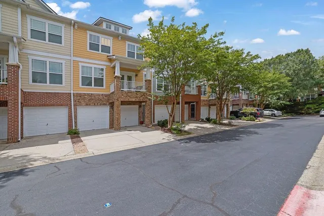 a view of a house with a street