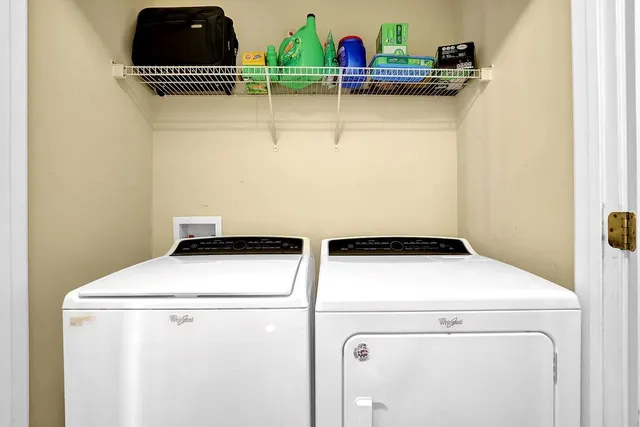 a utility room with dryer and washer