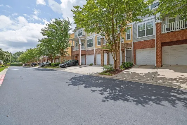 a view of a house with a street