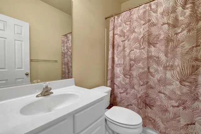 a bathroom with a sink and a toilet