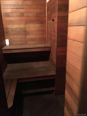 a view of a patio with table and chairs with wooden fence and plants