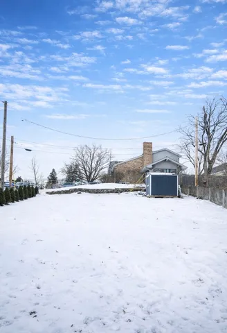 a view of ocean and with trees