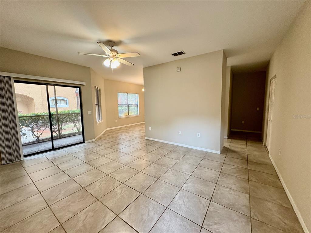 2199 Chianti Place, Unit 918 Palm Harbor, FL 34683 - Photo 2 of 23 a view of an empty room with a window