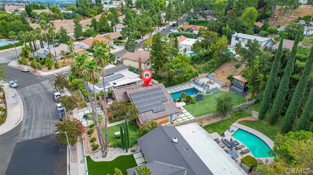 18810 Kirkcolm Lane Porter Ranch, CA 91326 - Photo 35 of 75 an aerial view of a house with a yard