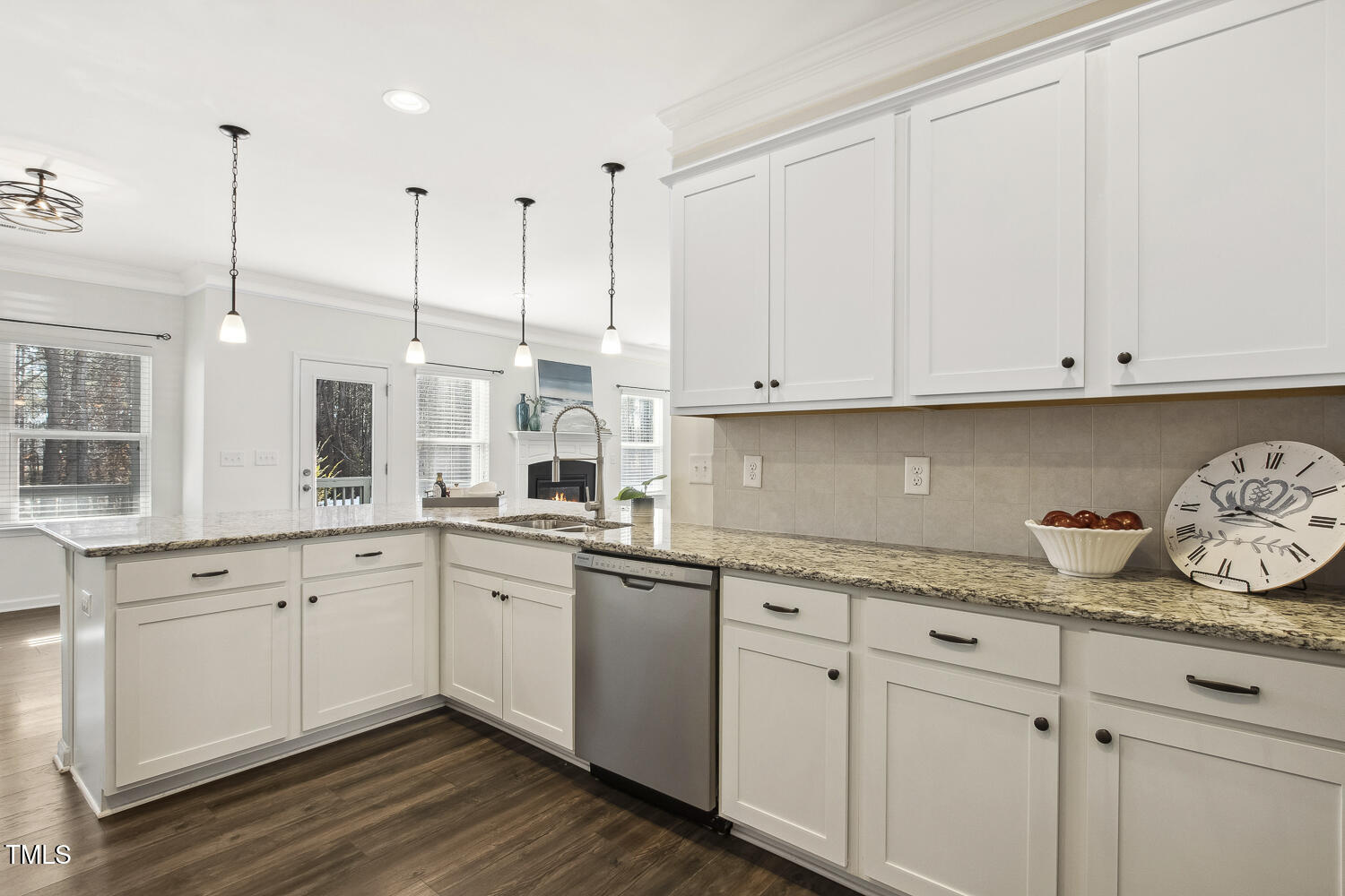 192 Springhill Lane Garner, NC 27529 - Photo 11 of 43 a kitchen with granite countertop white cabinets and sink