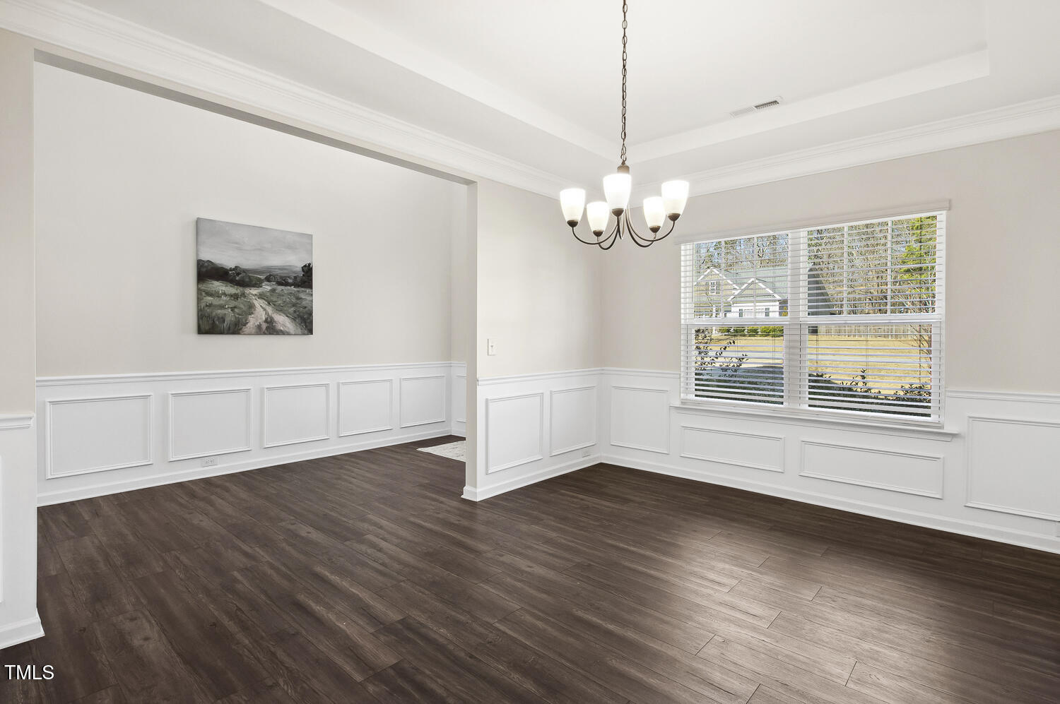 192 Springhill Lane Garner, NC 27529 - Photo 8 of 43 wooden floor in an empty room with a window