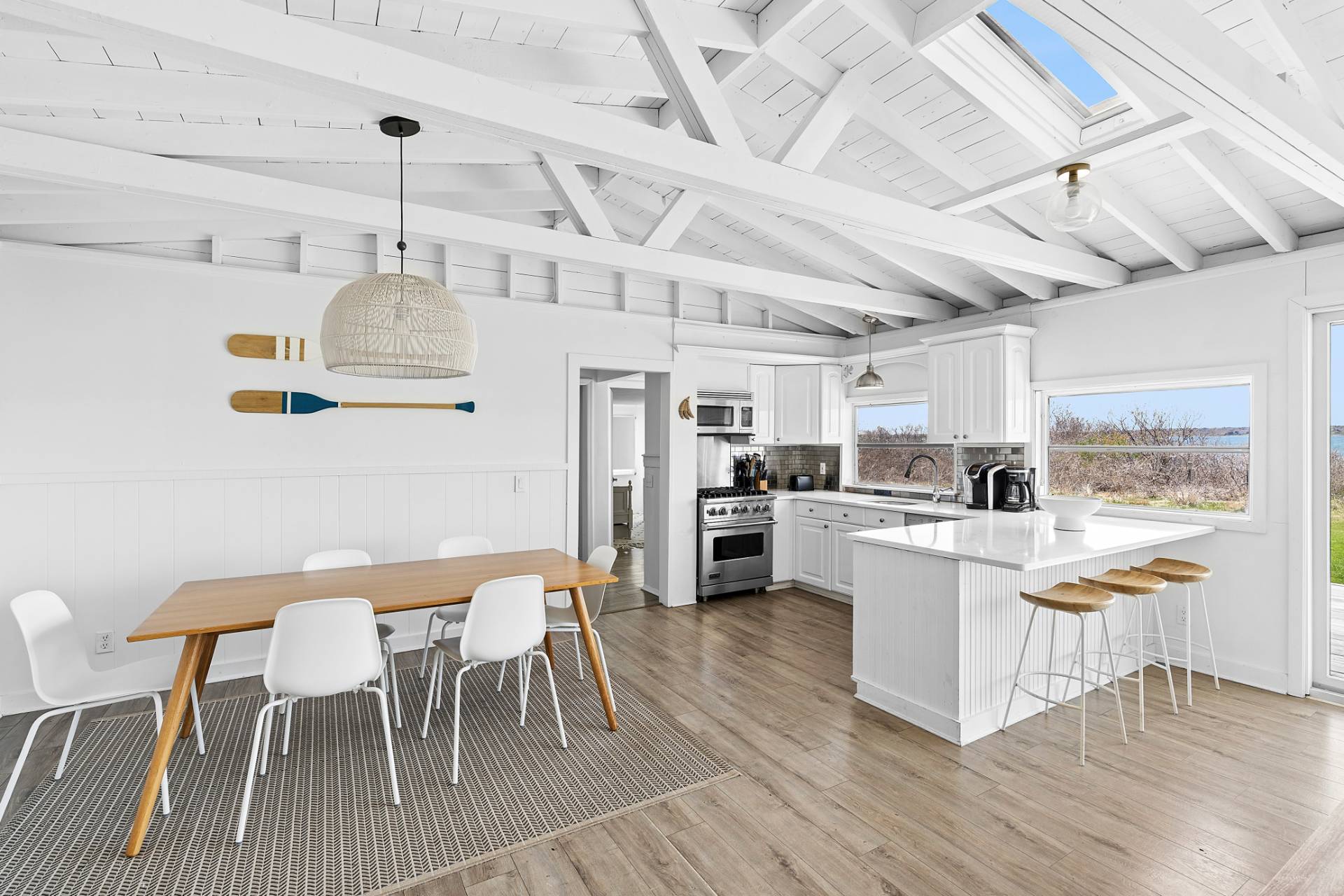 351 East Lake Drive Montauk, NY 11954 - Photo 4 of 30 a kitchen with cabinets and wooden floor