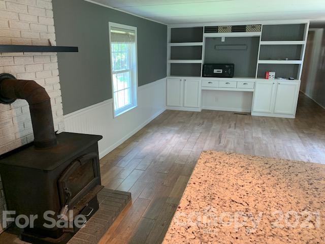 422 Ewaldz Road Blacksburg, SC 29702 - Photo 5 of 15 a living room with furniture and a fireplace