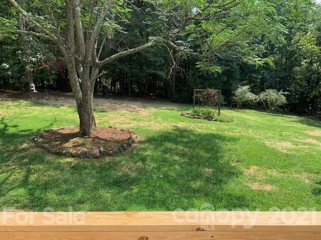 422 Ewaldz Road Blacksburg, SC 29702 - Photo 10 of 15 a backyard of a house with lots of green space