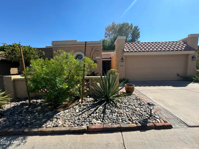 a view of a backyard with plants