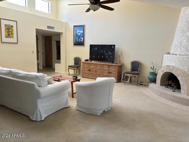 10606 North 8th Street Phoenix, AZ 85020 - Photo 13 of 25 a living room with furniture a flat screen tv and a fireplace