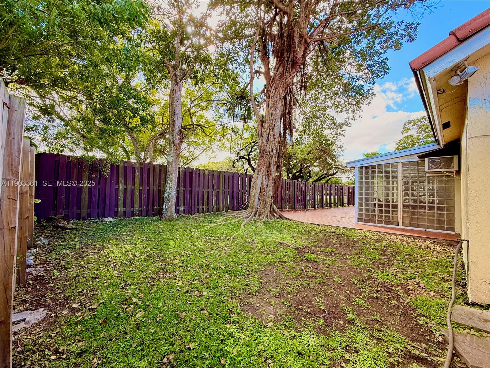 14970 Southwest 46th Terrace Miami, FL 33185 - Photo 19 of 27 a view of a house with backyard and porch