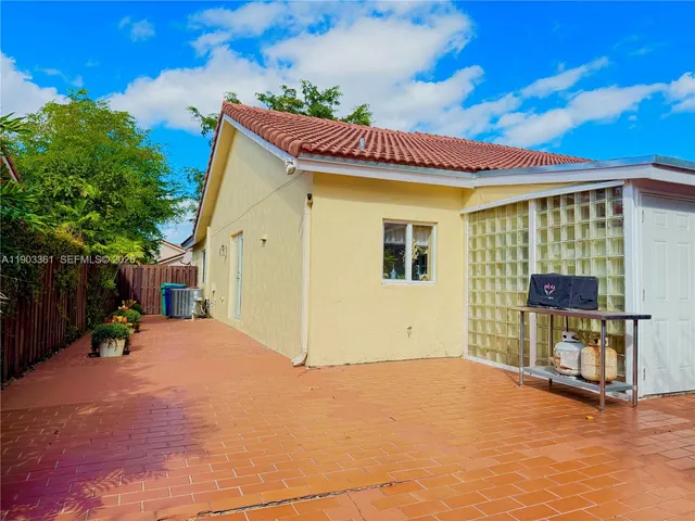 a view of a house with a patio