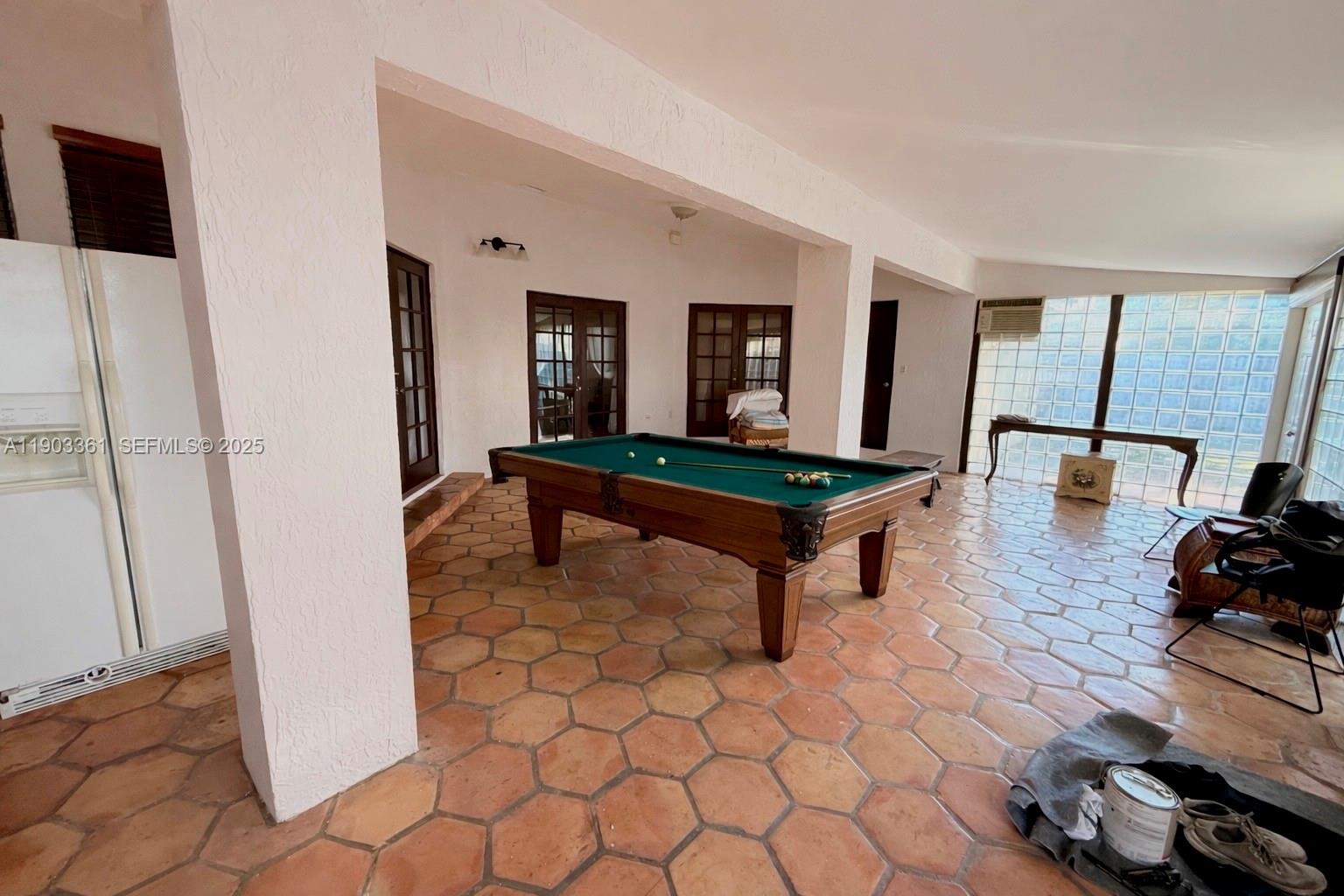 14970 Southwest 46th Terrace Miami, FL 33185 - Photo 27 of 27 a living room with furniture and wooden floor