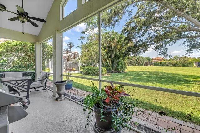 a bedroom with a bed and a table