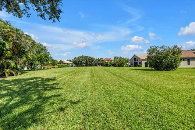 a view of a room with wooden floor and closet