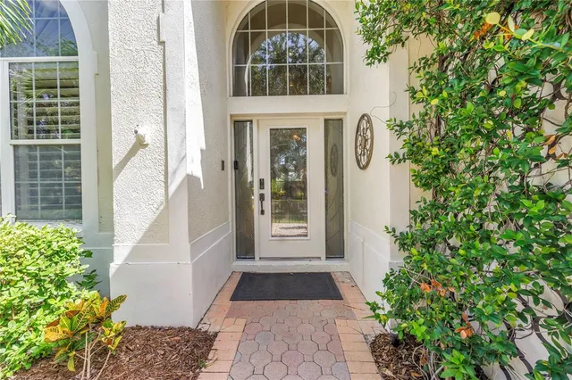 a view of a garden with a building in the background