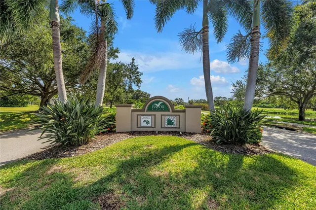 a view of yard with swimming pool and green space