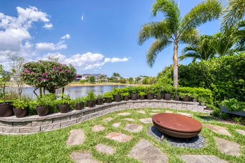 a view of a swimming pool with an outdoor space and seating area